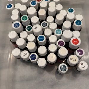 Young Living Essential Oil Set & book - lot of 57 - NEW or slightly used.